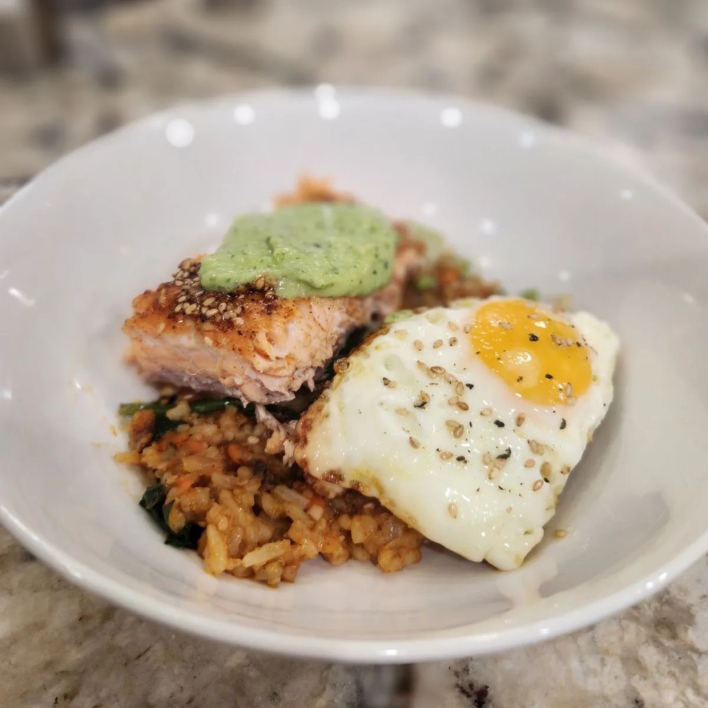 Gochujang Fried Rice Topped with Creamy Avocado Lime Salmon.
